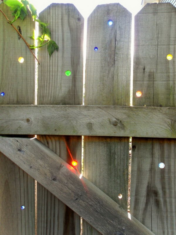 Glass marbles in your fence 