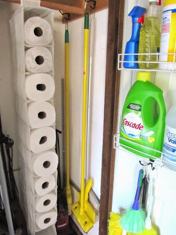 Use A Hanging Shoe Organizer To Hold The Unused Paper Towels 