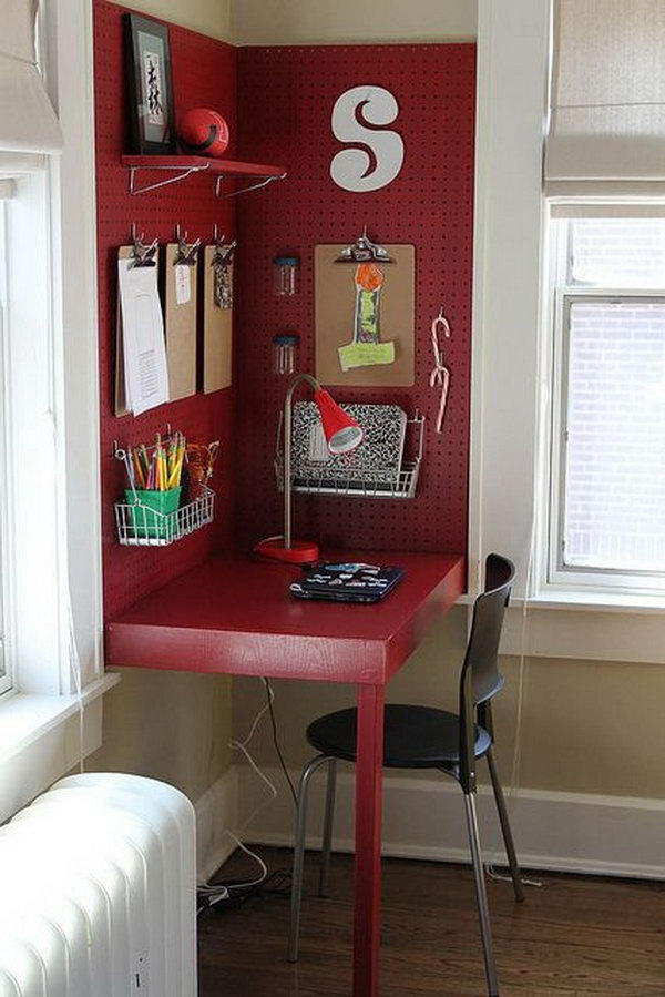 Make use of a corner for a desk backed with pegboard 