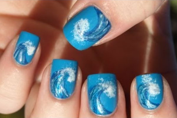 Ocean Waves Nail Designs.  Put the waves of the beach on your nails for a different looking manicure. This design looks complex, but it is actually very simple to make. Follow the video tutorial and enjoy this creative nail design 