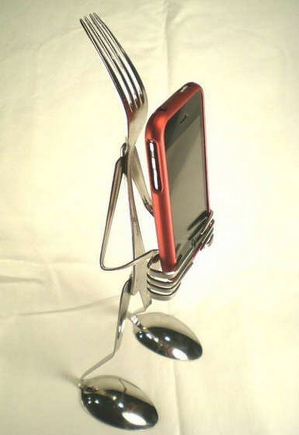 Cutlery IPhone Stand. Two spoons and three forks to hold up your cellular. 