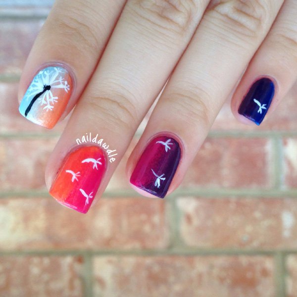 Pretty White Colored Dandelion over Colorful Gradients Nails. 