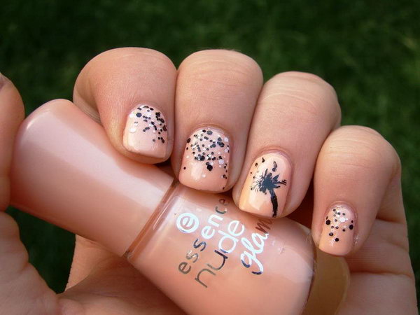 Orange Base Silver Glitter Dandelion Nail Design. 