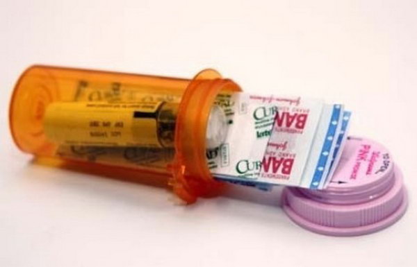 DIY Mini First aid Kit Using a Prescription Bottle. See more details 