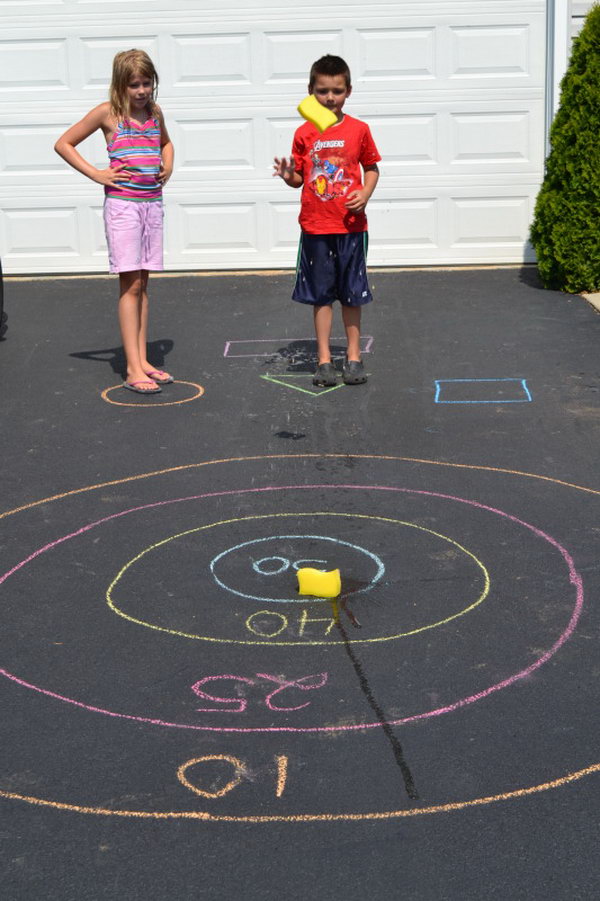 DIY Target Outdoor Games. Draw a bullseye and assign score for each circle of the target. The kids toss their sponge at the starting line. It’s great to train your kids’ throwing accuracy in this funny way in summer. 