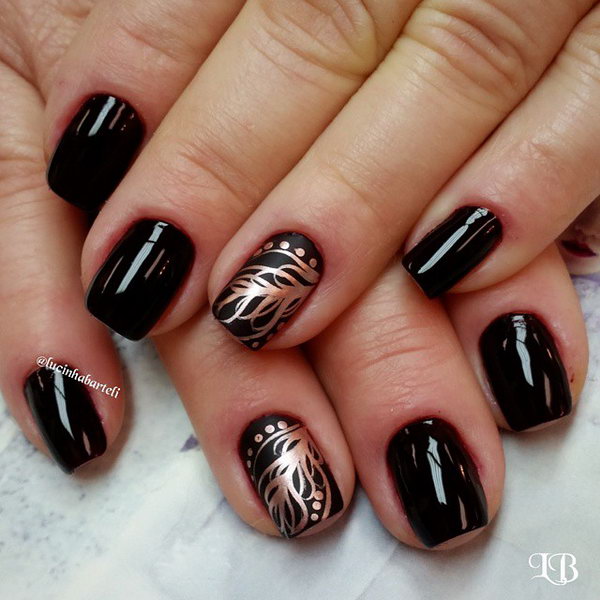 Golden Feather Nail Art. Very pretty! I have to say, I am really into this feather design. 