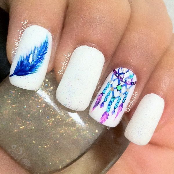 White Nail Design with Dreamcather and Feather. Very pretty! I have to say, I am really into this feather design. 