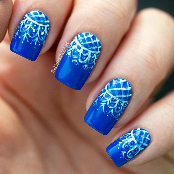 White Lace over Blue Background Nails. See more details 