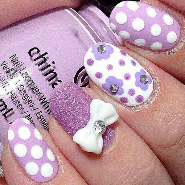 Purple Glitter Nail with Polka Dots and Bow. 