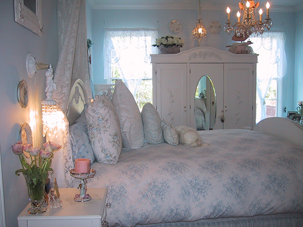 Blue Touched White Bedspread and Painted Walls Create a Shabby Chic Look. 