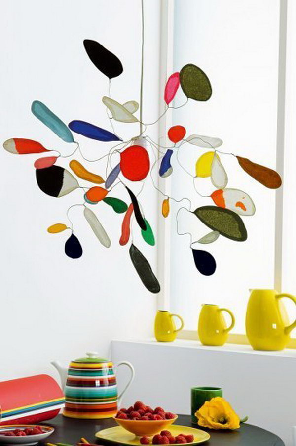 Calder Inspired Mobile Made with Tissue Paper and Wire. This tissue paper mobile looks sophisticated enough to hang in any room in the house. See more directions 