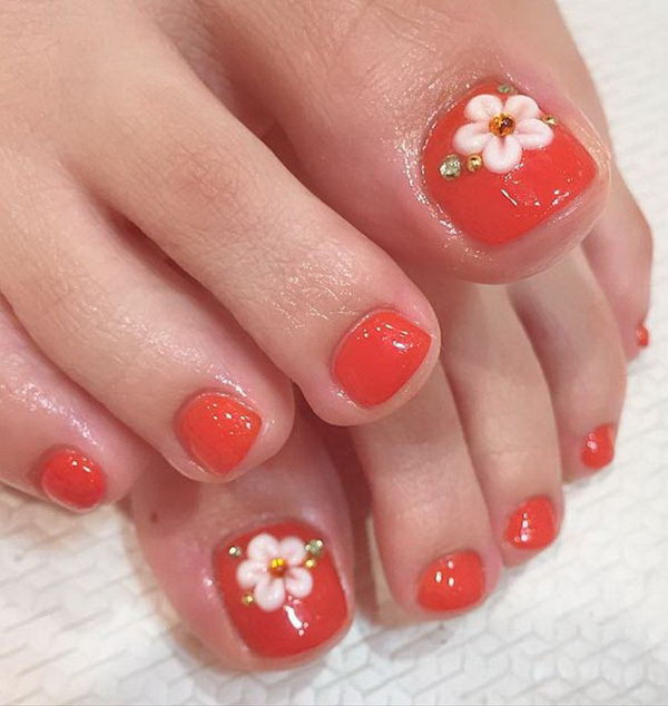 Flowers and Rinestones Accented Toe Nail Design. 
