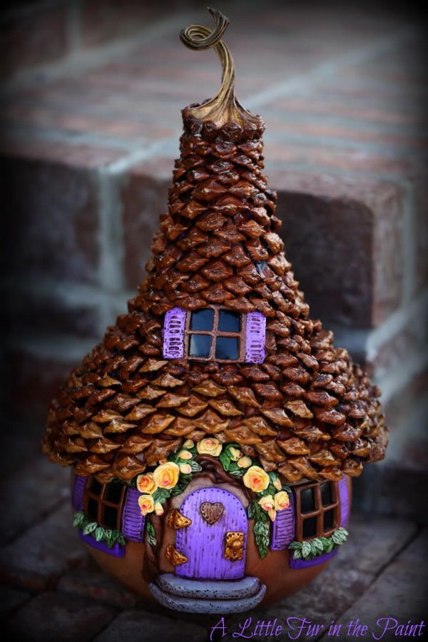 Step by Step Pine Cone Fairy House Tutorial. Adorable fairy house with lots of pictures and a complete tutorial to build one for your garden. 