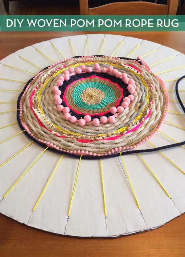 Woven Rug using a Cardboard Loom. Detailed tutorial on how to make a pretty rug from old t shirts, on a cardboard loom or hula hoop loom! 