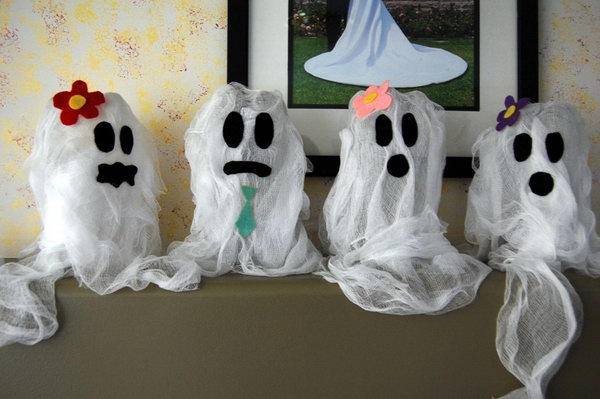 Cute Recycled Soda Bottle Ghosts for Halloween. 