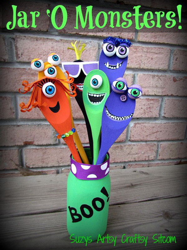 Jar O' Monsters Halloween Decor Made with Wooden Spoons and a Recycled Jar. 