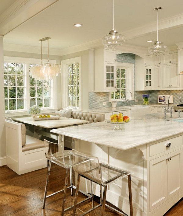 White Princess Quartzite Countertop With White Cabinets And A Pop Of Green. 