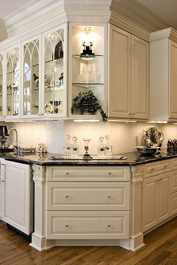Gorgeous White Kitchen Corner With Black Countertops. 