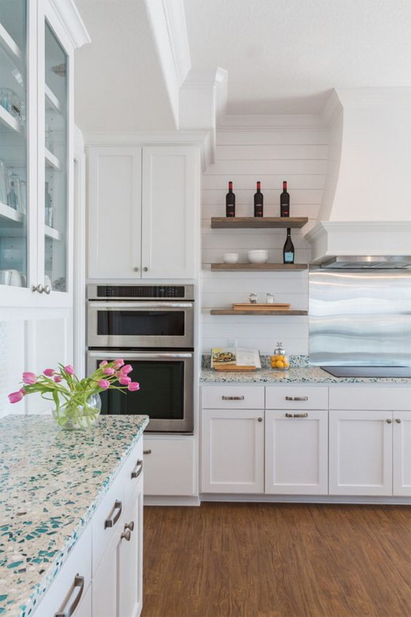 Recycled Glass Countertop With White Cabinets. 