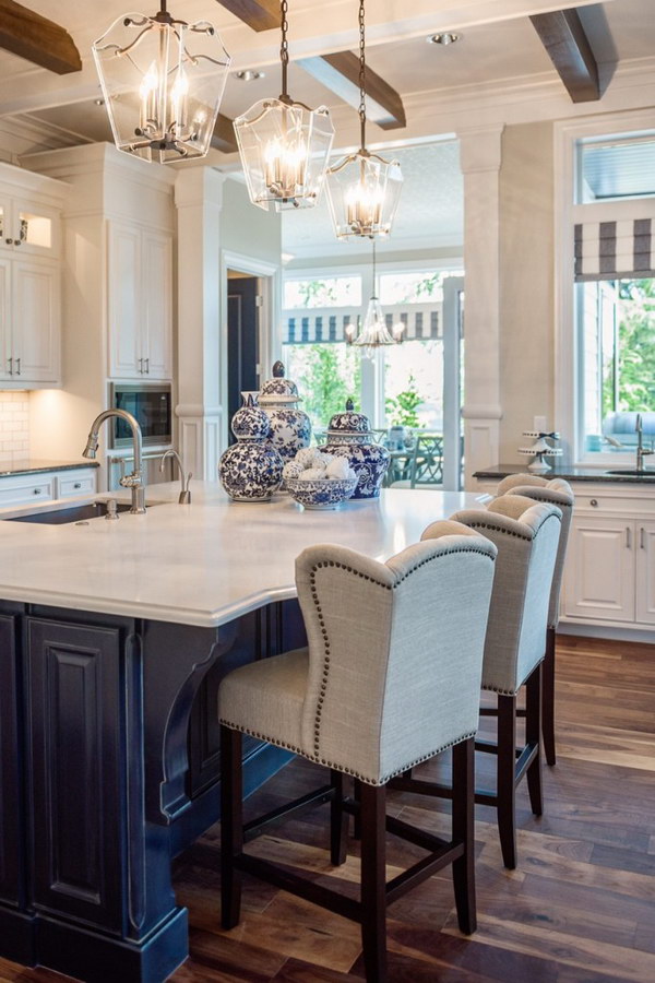 White Kitchen Countertop With Stylish Light. 