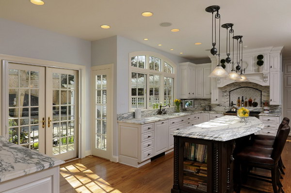 Stunning White Kitchen With Marble Countertops. 