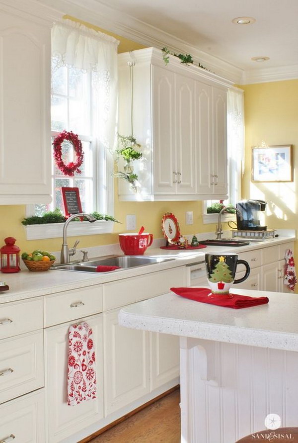 Cream White Kitchen Cabinets Paired with Soft Yellow Walls. 