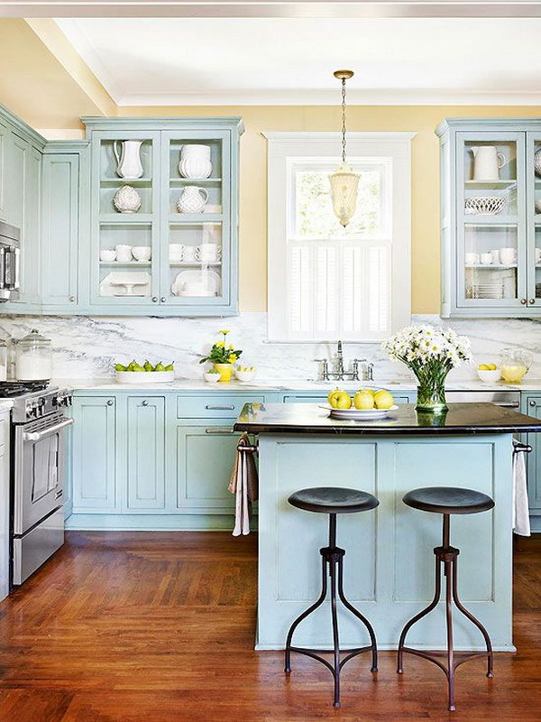 Blue green Kitchen Cabinets with Glass Cupboards for Display. 