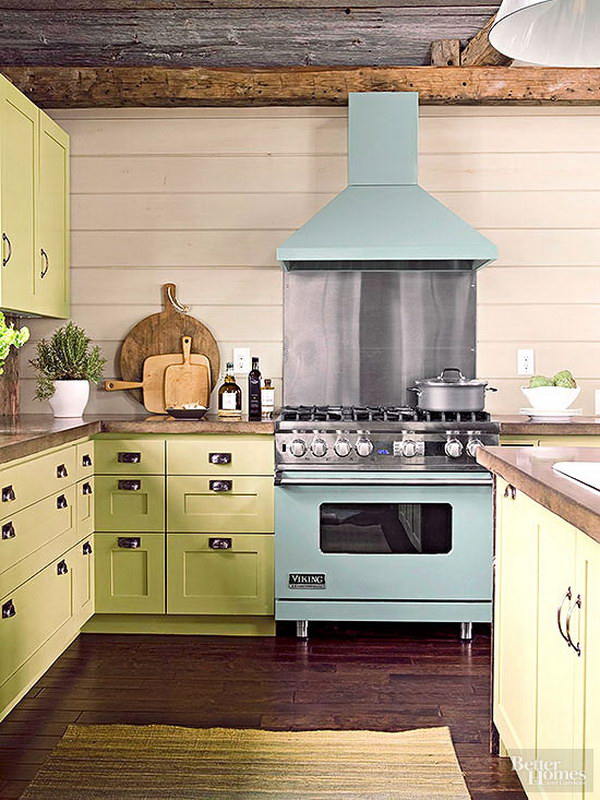 Pale Yellow Green Celadon Cabinetry in a Casual Cottage Kitchen. 