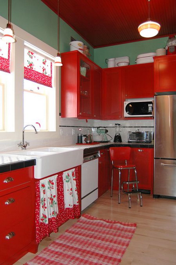 Cottage Kitchen with Bright Red Painted Cabinets. 