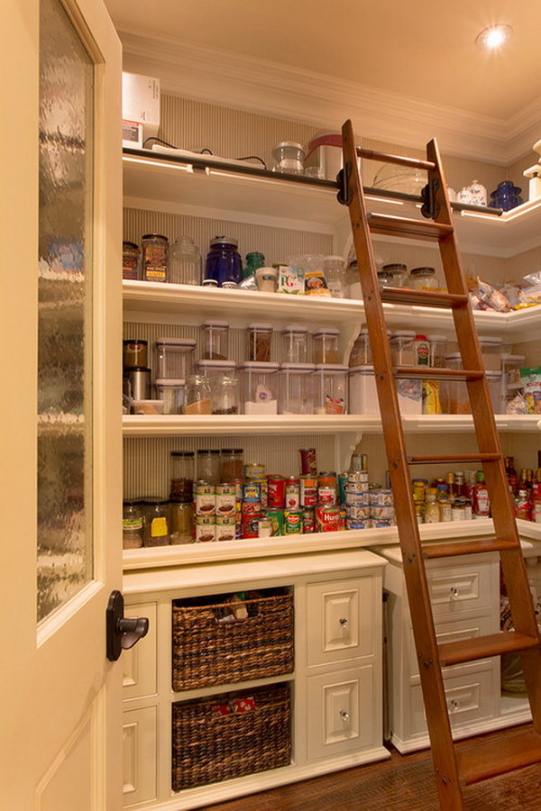 Traditional Kitchen Pantry with a Cool Wooden Ladder for Easy Access to Everything. 
