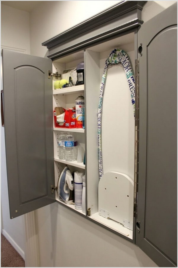 Shallow Closet with Hidden Storage for Laundry Supplies and A Fold Out Ironing Board. 