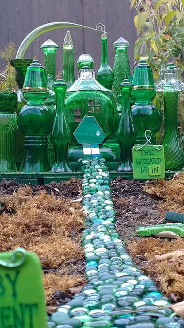 Mini Emerald City Fairy House Made With Green Glassware. 