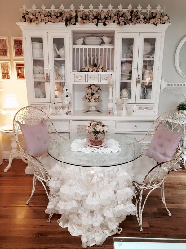 Lovely Shabby Chic Dining Room with White Hutch and a Glass Table Decorated with Cute Ruffled Tablecloth 