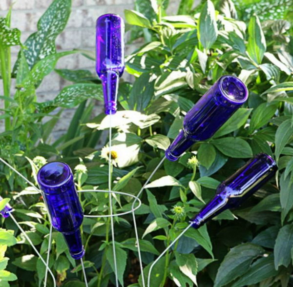 TOMATO CAGE BOTTLE TREE made with blue beer bottles 