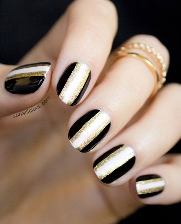Sparkly Black & White Nails with a Touch of Gold. 
