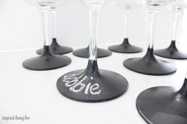 Use chalkboard dipped wine glasses to help distinguish whose is whose 