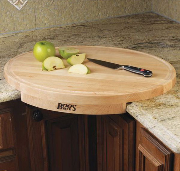 John Boos Corner Cutting Board. This oval shaped maple wood cutting board converts a counter corner space into efficient working space. Get it at 