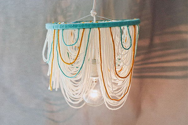 Yarn Chandelier. Check out the tutorial 