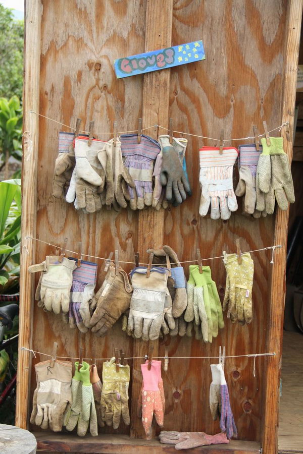 Use Some Clothes Hooks and Some Rope to Dry Your Gloves. 