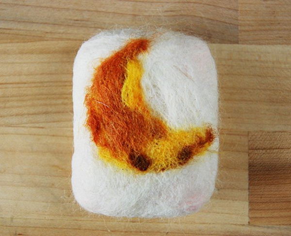 DIY Felted Soap Tutorial. The antibacterial felted soaps covered with wool are exfoliating. You can use simple bar soap and felt it with wool for a unique gift idea. 