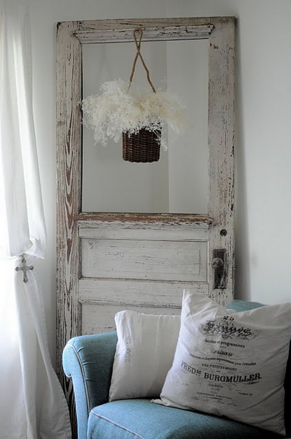 Vintage Door Turned Flower Hanger. I absolutely love it, it looks awesome design. 