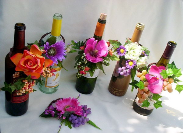 Wine Bottle with Fresh Flowers Wedding Centerpiece. 