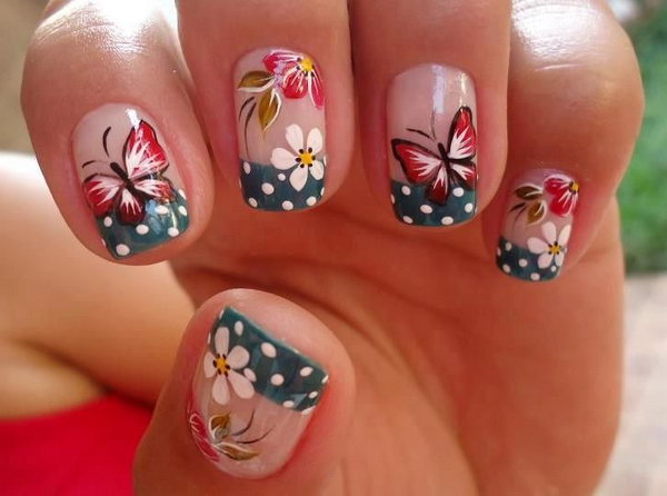 Dark Blue & White Polka Dot French Tip Manicure with Butterflies and Flowers. 