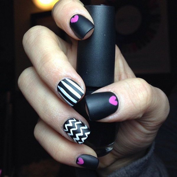 Black and White Chevron Nails Accented with Pink Hearts. 