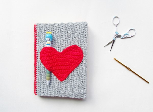 Crochet Notebook Sweater. This crochet notebook sweater looks so cute with a red heart ornament. You can even tuck little things like notes and pens into the heart pocket. So convenient! You can learn how to make it 