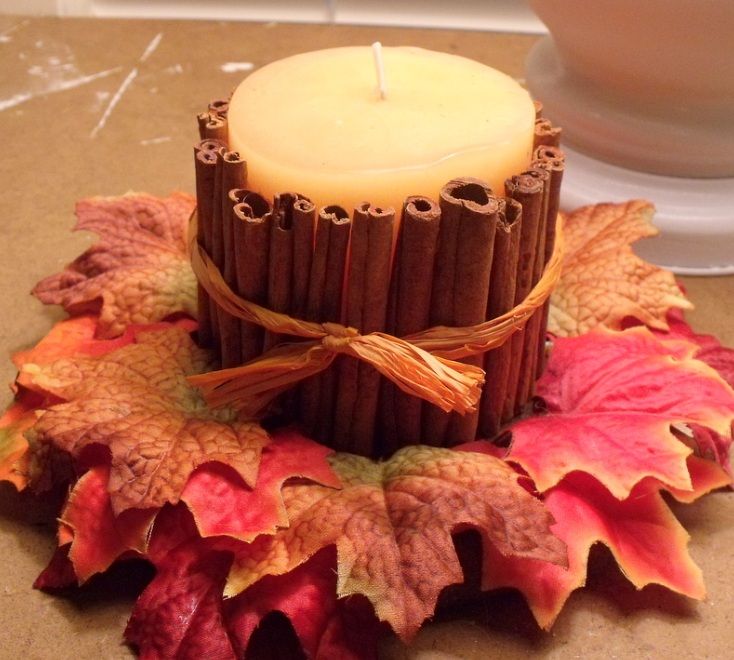 Cinnamon Candles.Simple way to make fall candles surrounded by cinnamon sticks! Smells and burns fabulous! Tutorial via 