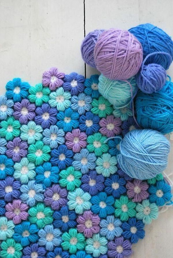 Stunning Crochet Flower Rug. Love your home with this crochet flower rug pattern and make a gorgeously rug that you will love forever. Get the free pattern via 