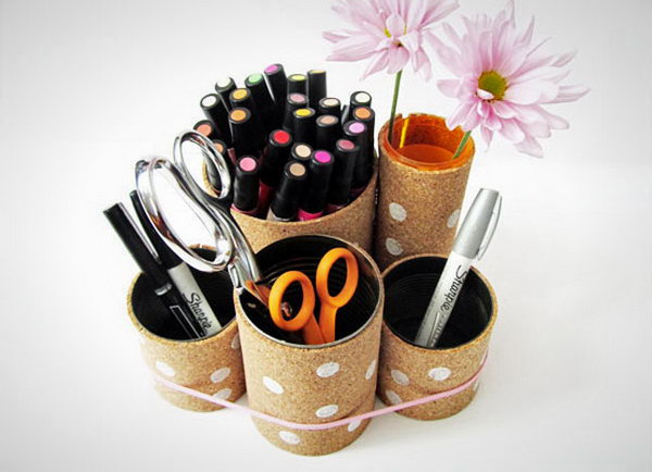 Cork Covered Cans. Wrapping tin cans in something cool, like cork board and adding some colorful accents like a stripe or polka dots. This cork covered cans will double as a decor on your desk. Learn how to make them 