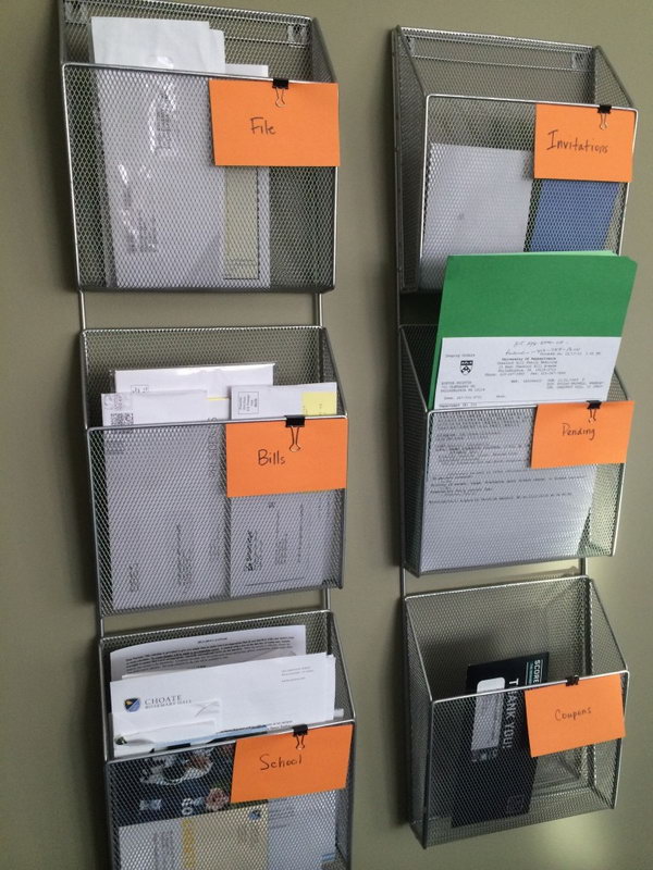 Simple Wall Based Filing System. This simple wall mounted filing system will help you make sure all your bills, school papers, work papers, receipts and all the other dreaded papers are in the right place. See more details 