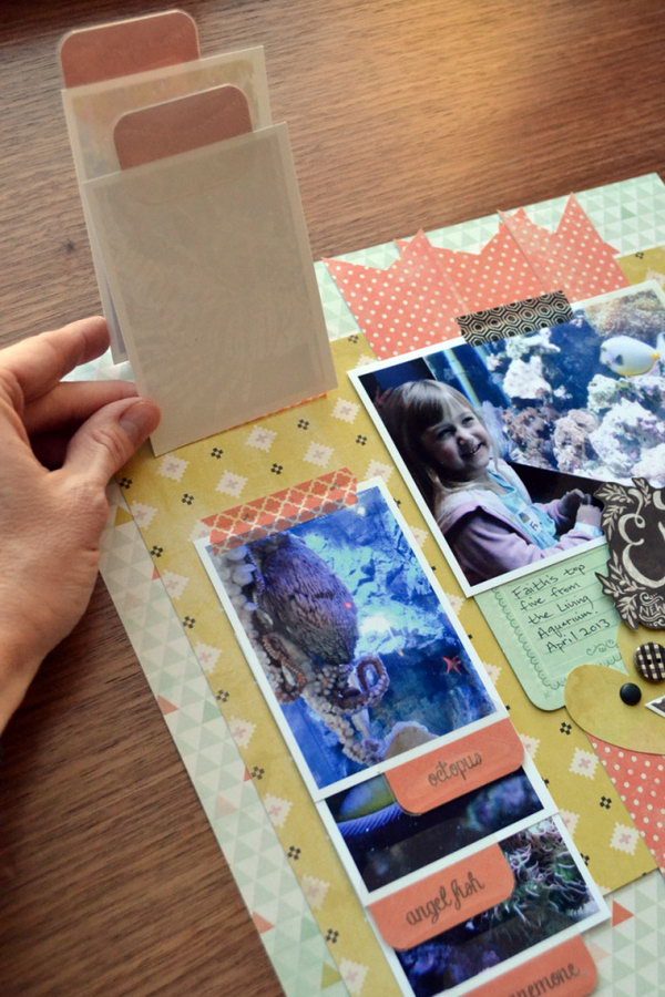Scrapbooking with the Tab Punch. A really fun way to make your scrapbook with a tub. Save space and wow anyone who looks at it. 